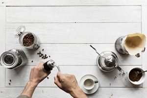 Aerial view of people making drip coffee